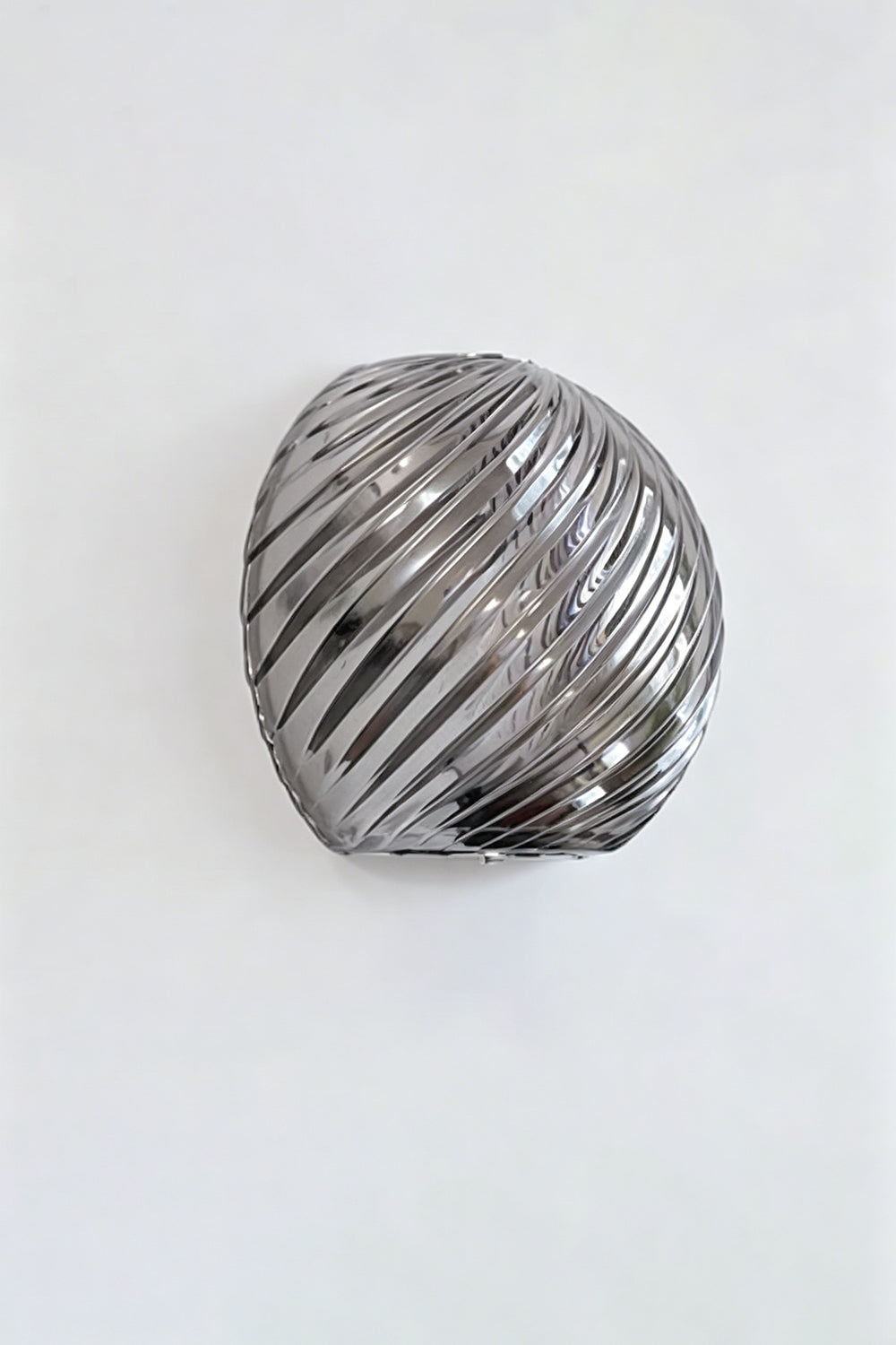 Silas Ribbed Glass Wall Sconce | Ribbed Glass, Metal | Studio unlit view of the smoky dark grey metallic ribbed glass finish option on a clean plain backdrop | vexa lamps