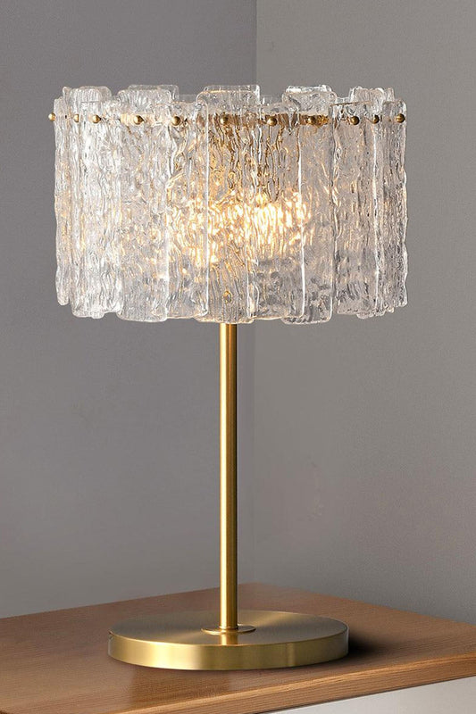 Solene Stacked Glass Table Lamp | Textured Glass and Brass | Placed on a side table next to a cream sofa in a living room | vexa lamps