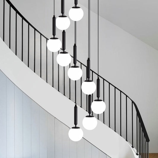 Morylighting Grand Luminous Spiral Iron & Glass Pendant - elegant American entryway with arched doorway