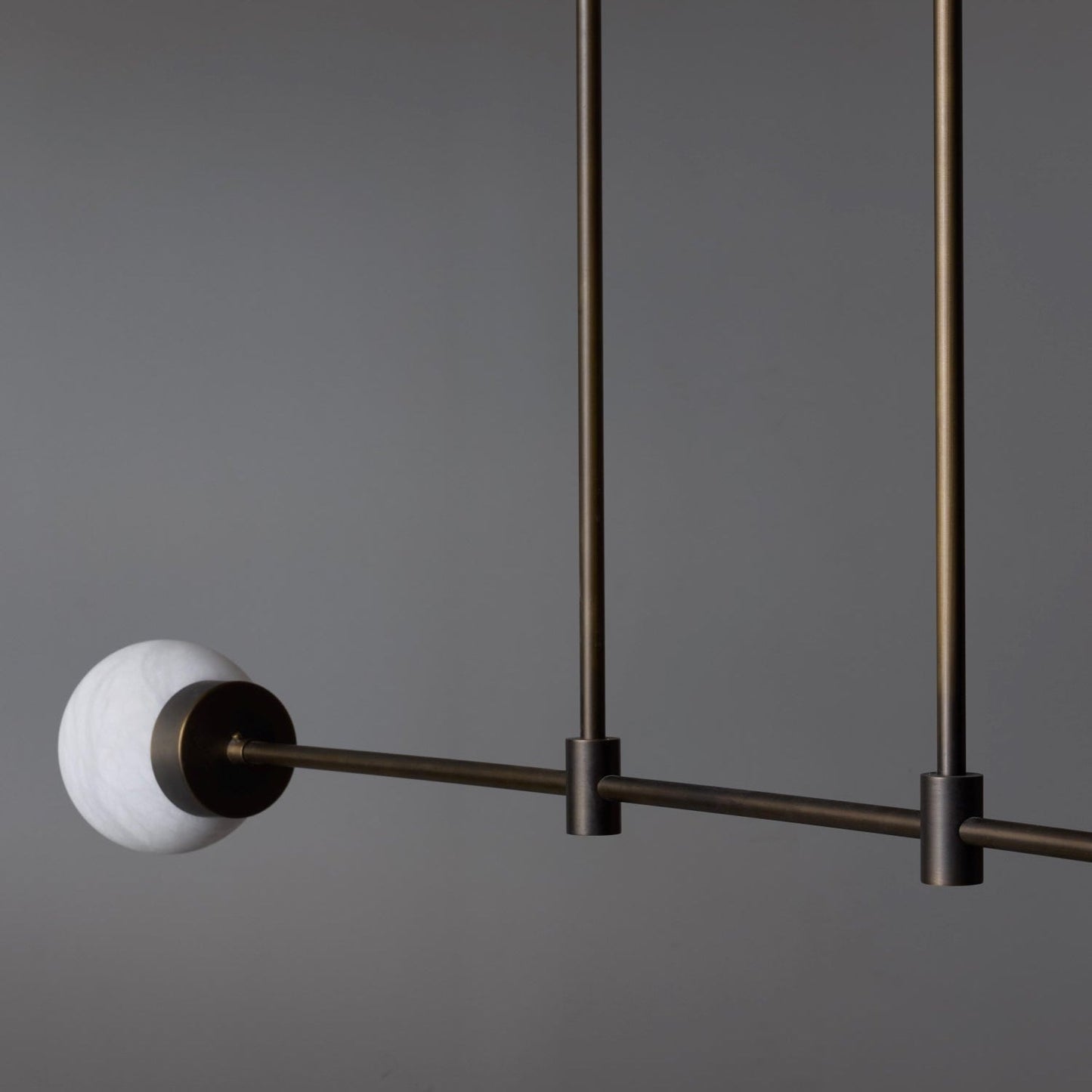 Brass and Alabaster Globes Asymmetrical Line Chandelier