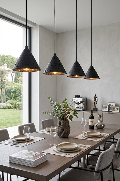 Linear arrangement of Aethel Core Pendants | Black Travertine, Metal | Modern dining room with long wooden table | vexa lamps
