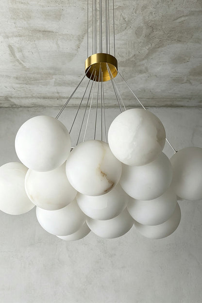 Amandine Alabaster Globe Cluster Pendant Light with elegant clustered design and gold accents.