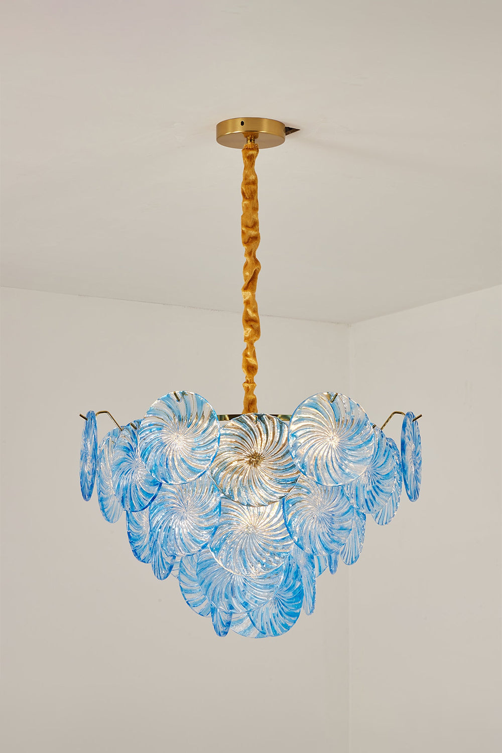 Amara Pink Glass Petal Chandelier | Unlit Blue Variation | Front studio view of the blue glass petal chandelier displaying its natural coloration against a clean light grey backdrop | vexa lamps