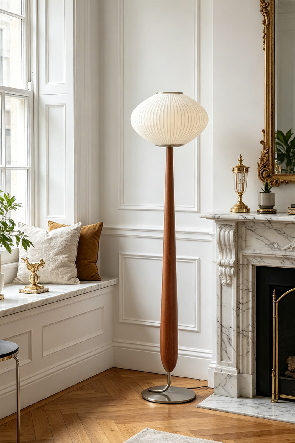 Arden Walnut Floor Lamp | Wood, Metal, Fabric | Positioned beautifully in a traditional living room corner featuring white windows, a classic mantle piece, and herringbone hardwood floors | vexa lamps