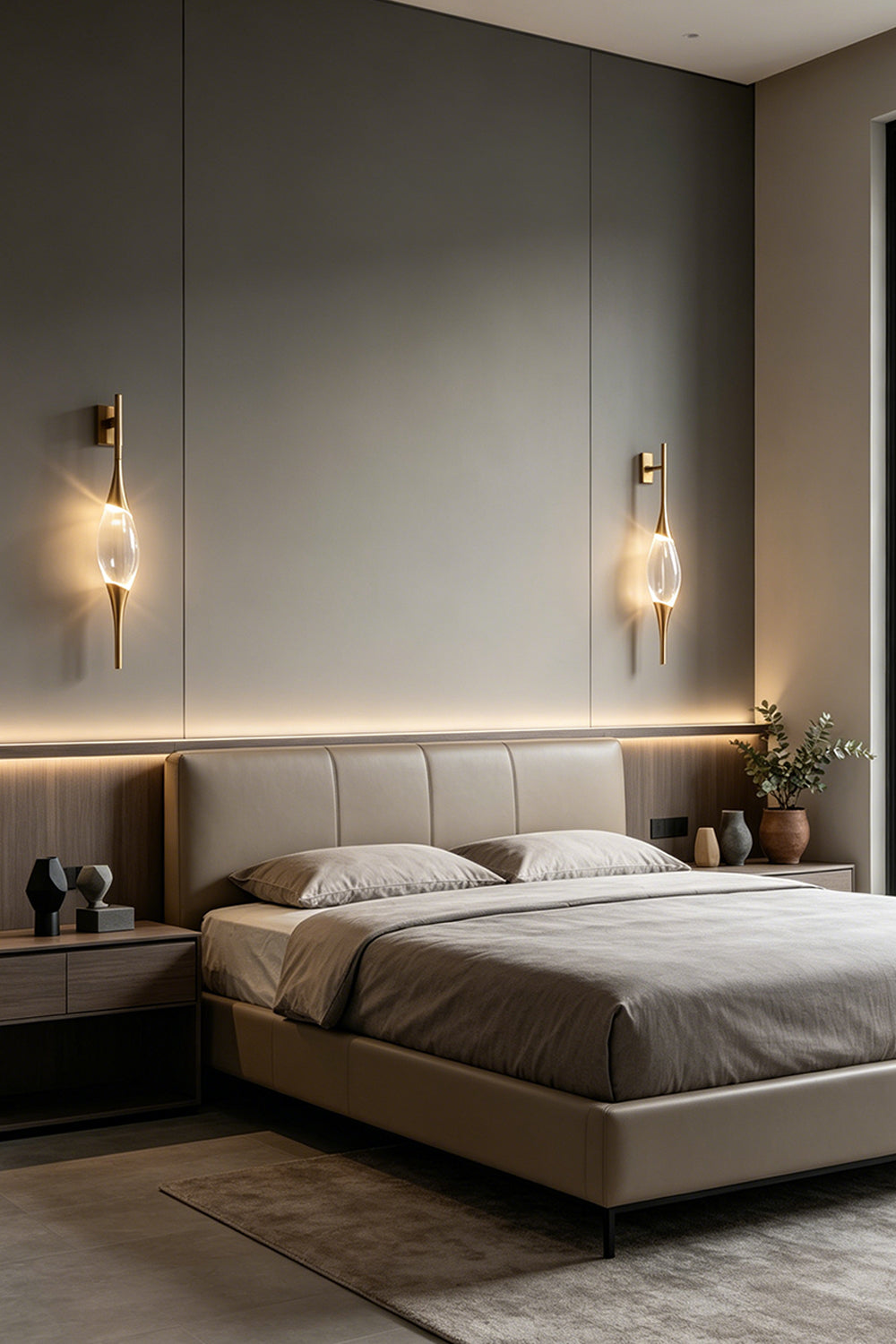 Astraea Crystal Linear Wall Sconce | Crystal, Brass | A pair of lit crystal sconces flanking a modern grey bed in a luxurious moody bedroom setting | vexa lamps