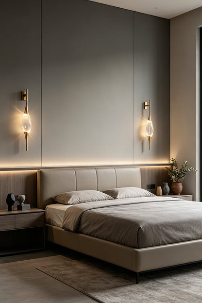 Astraea Crystal Linear Wall Sconce | Crystal, Brass | A pair of lit crystal sconces flanking a modern grey bed in a luxurious moody bedroom setting | vexa lamps