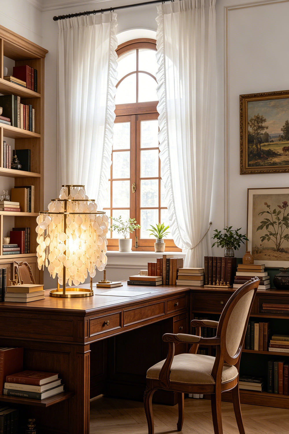 Aurelia Tiered Capiz Table Lamp | Capiz Shell, Metal | Alternative view of the traditional home office layout with the glowing shell lamp as a desk centerpiece | vexa lamps