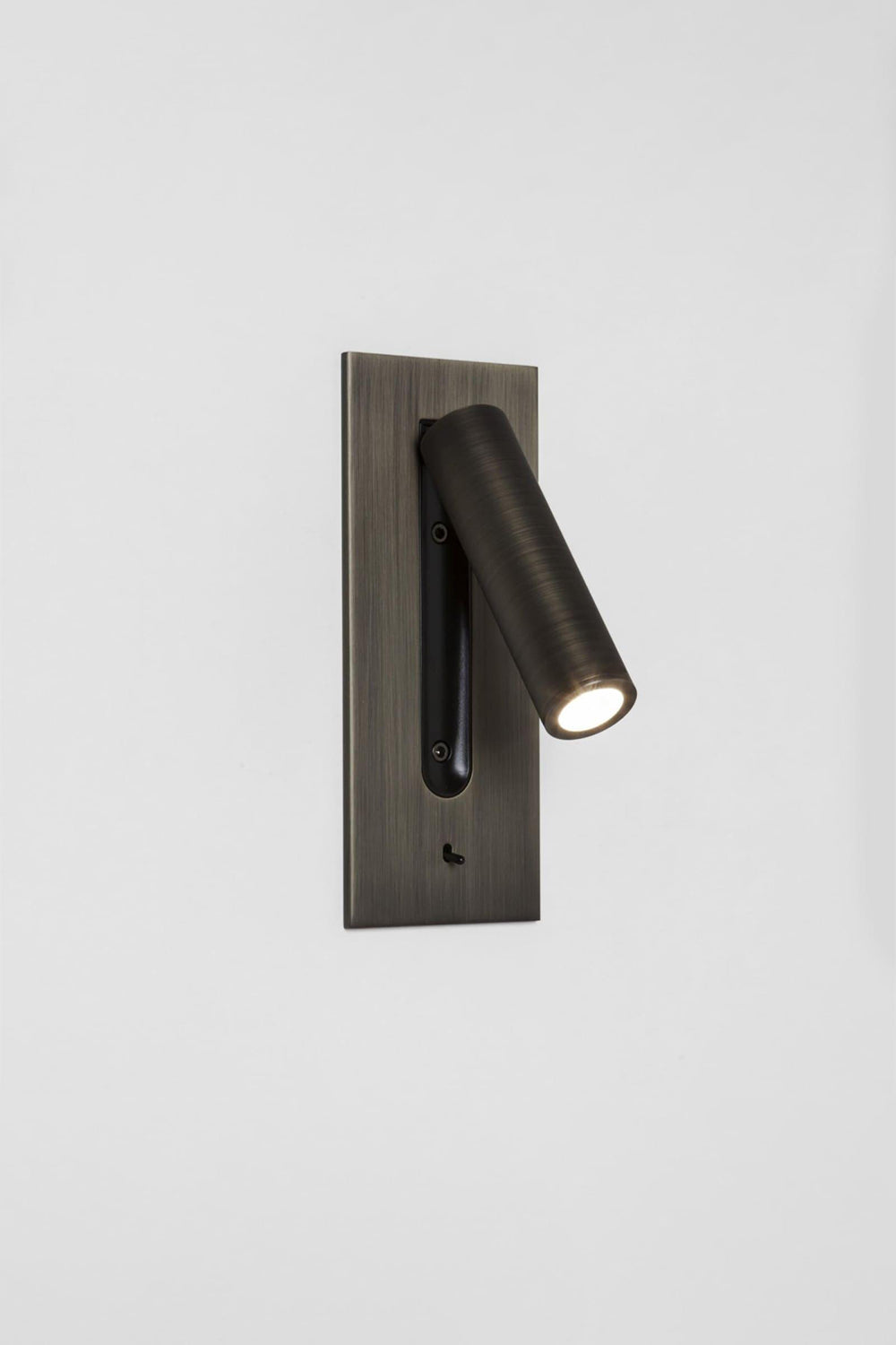 Axial Pivot Folding LED Wall Lamp mounted on a brushed metal backplate, providing focused illumination.