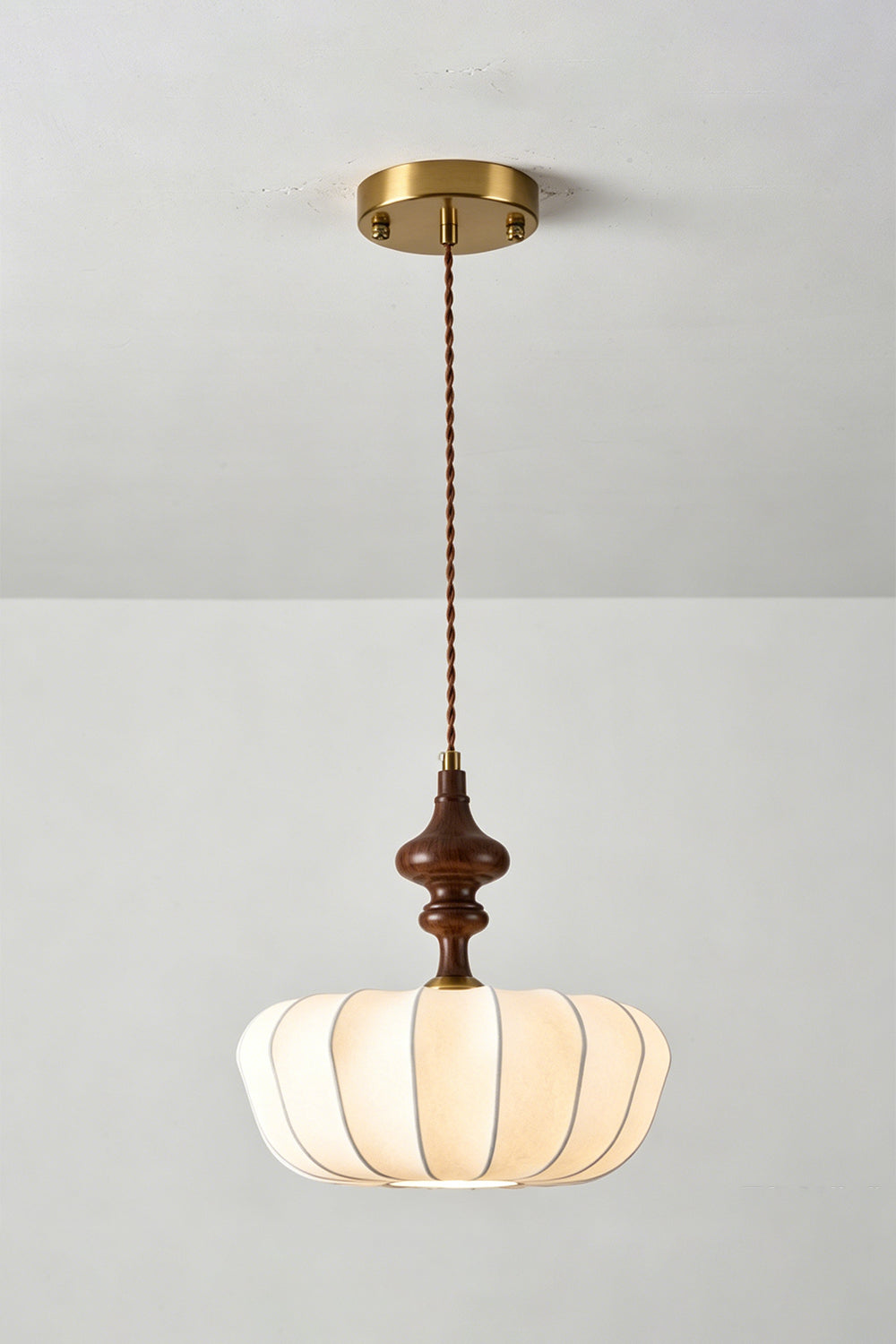 Baird Mid-Century Silk Pendant Light with pumpkin-shaped silk shade and walnut-toned wooden spindle.