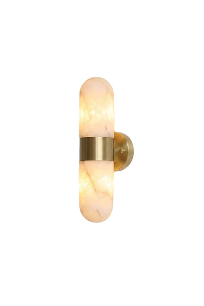 Calla Alabaster Capsule Wall Sconce | Alabaster, Brass | Isolated lit view of a modern capsule-shaped wall sconce featuring a natural white alabaster stone shade and a central brushed gold brass band | White background | vexa lamps