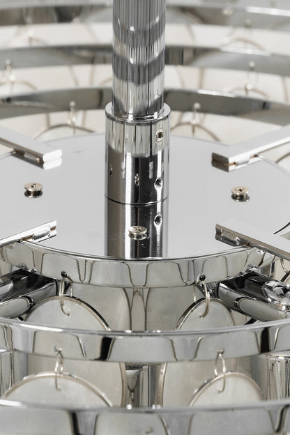 Chrome hardware and tiered frame detail | Iron | Close-up of the polished silver rods and tiers | vexa lamps