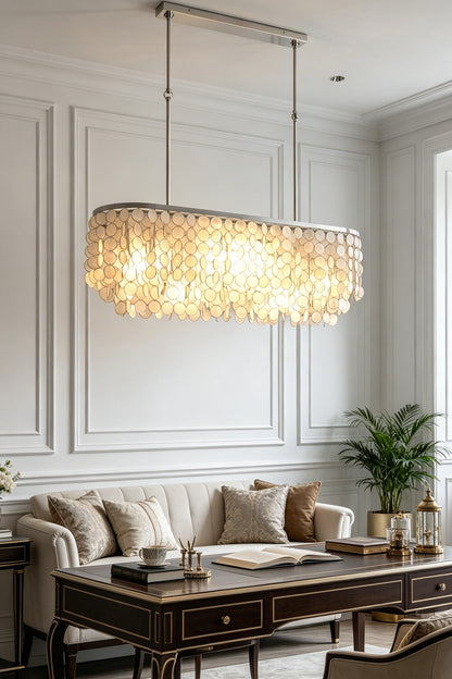 Luxury elongated shell chandelier | Iron | Shell | Hanging in a sophisticated living room over a dark coffee table | vexa lamps