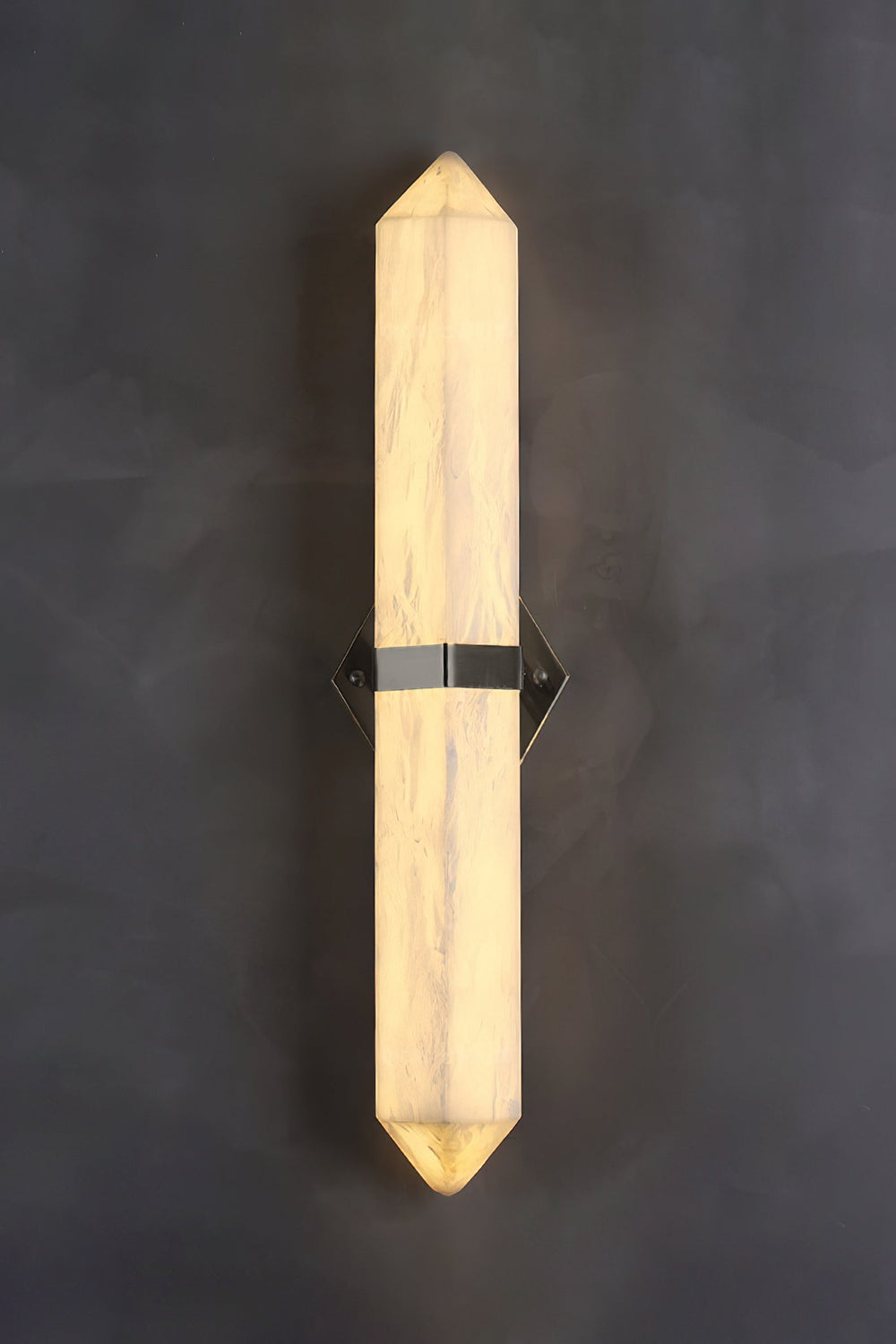 Cassian Faceted Alabaster Wall Sconce showcasing a geometric alabaster design with brass-toned bracket.