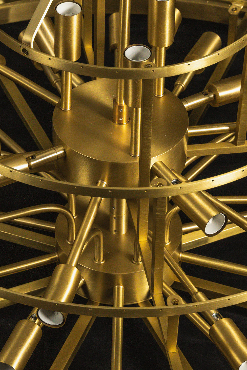 Cassian Tiered Prism Ring Chandelier | Clear Prism Glass and Brass | Bare brass skeleton frame showing tiered rings and light sockets | vexa lamps