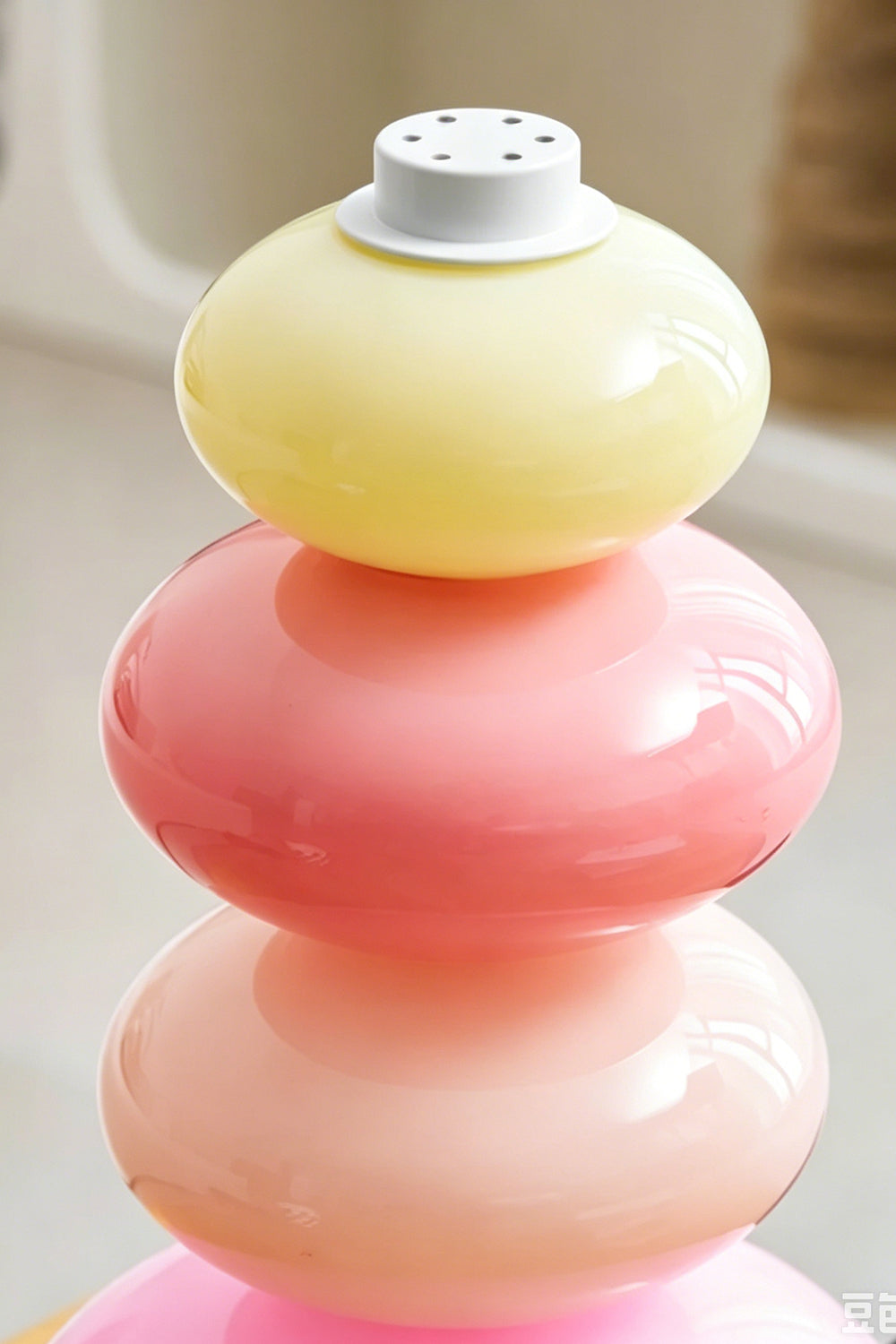 Dolce Stacked Pastel Glass Table Lamp | Glass, Metal | Detailed close-up showing the translucent pastel yellow and pink rounded glass segments | Detail shot | vexa lamps
