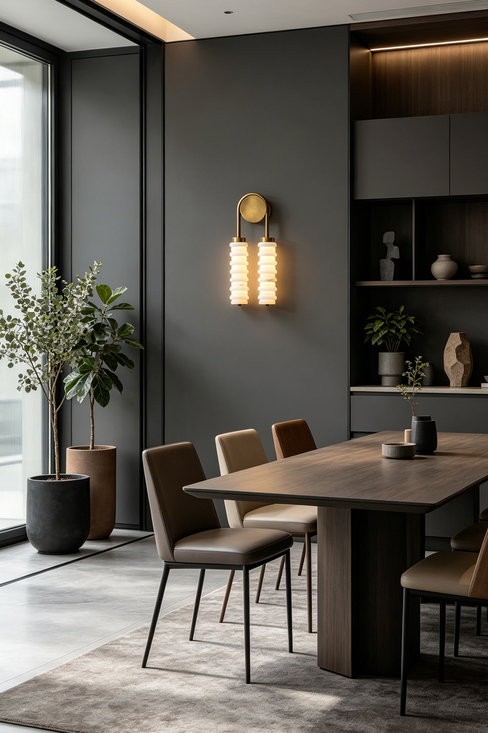 Dual Strata Alabaster Wall Lamp | Metal, Alabaster | Lit lamp providing elegant accent lighting in a sophisticated contemporary dining room | vexa lamps