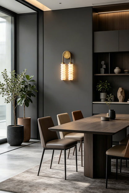 Dual Strata Alabaster Wall Lamp | Metal, Alabaster | Lit lamp providing elegant accent lighting in a sophisticated contemporary dining room | vexa lamps