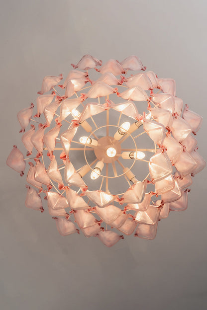 Elysian Bloom Rose Glass Chandelier | Metal, Glass | Directly looking up into the illuminated chandelier, showcasing the radial petal arrangement | Detail shot | vexa lamps