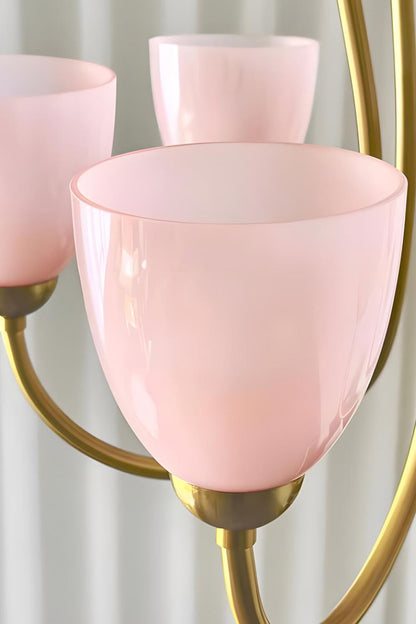 Close-up of illuminated pink glass shades on a Ethereal Floret Chandelier | Metal, Glass | Detail shot of lit shades on metal arms | vexa lamps