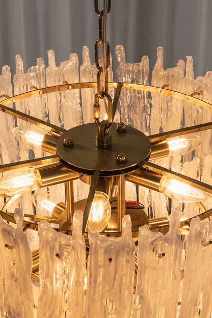 Ethereal Icicle Waterfall Chandelier | Glass, Metal | Internal top-down view showing the radial gold metal frame and lit bulb configuration | Detail shot | vexa lamps