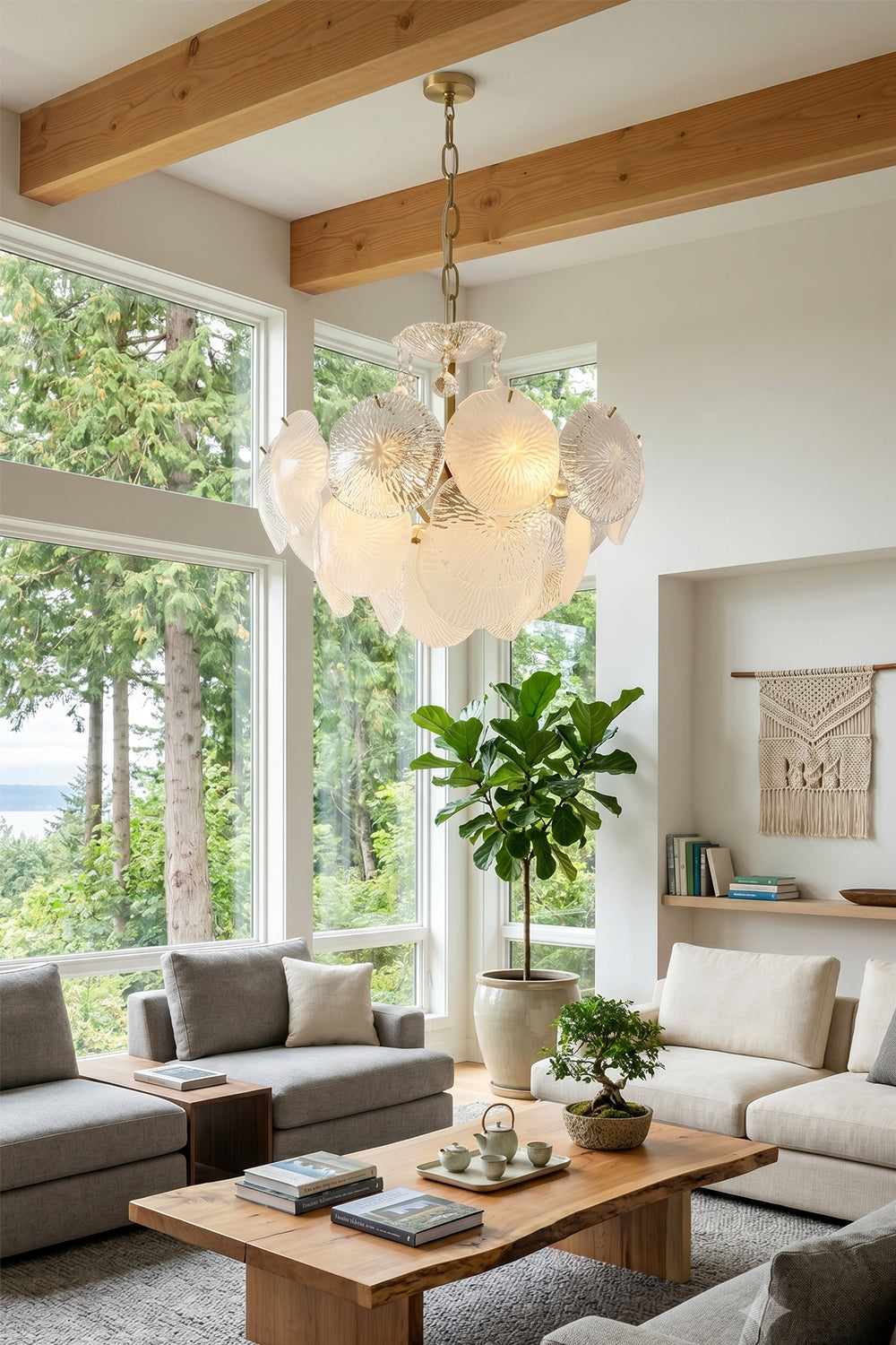 Fiore Radiance Glass Disc Chandelier hanging in bright living room with modern furniture and large windows.