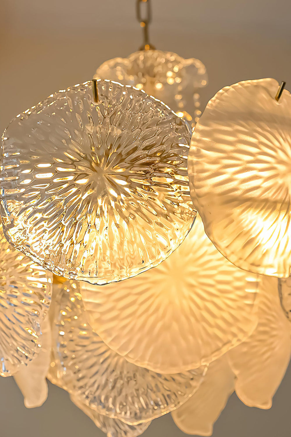 Fiore Radiance Glass Disc Chandelier featuring elegant, hand-finished glass discs with luminous texture.