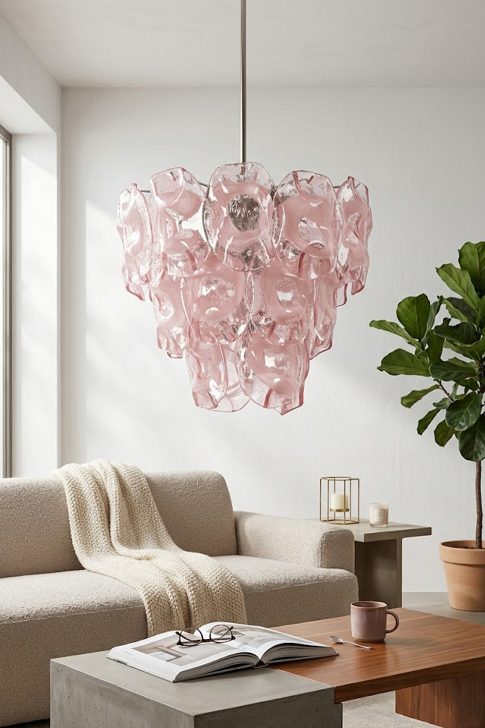 Tiered pink glass pendant light | Metal, Glass | Hanging in a bright living room over beige sofa | vexa lamps