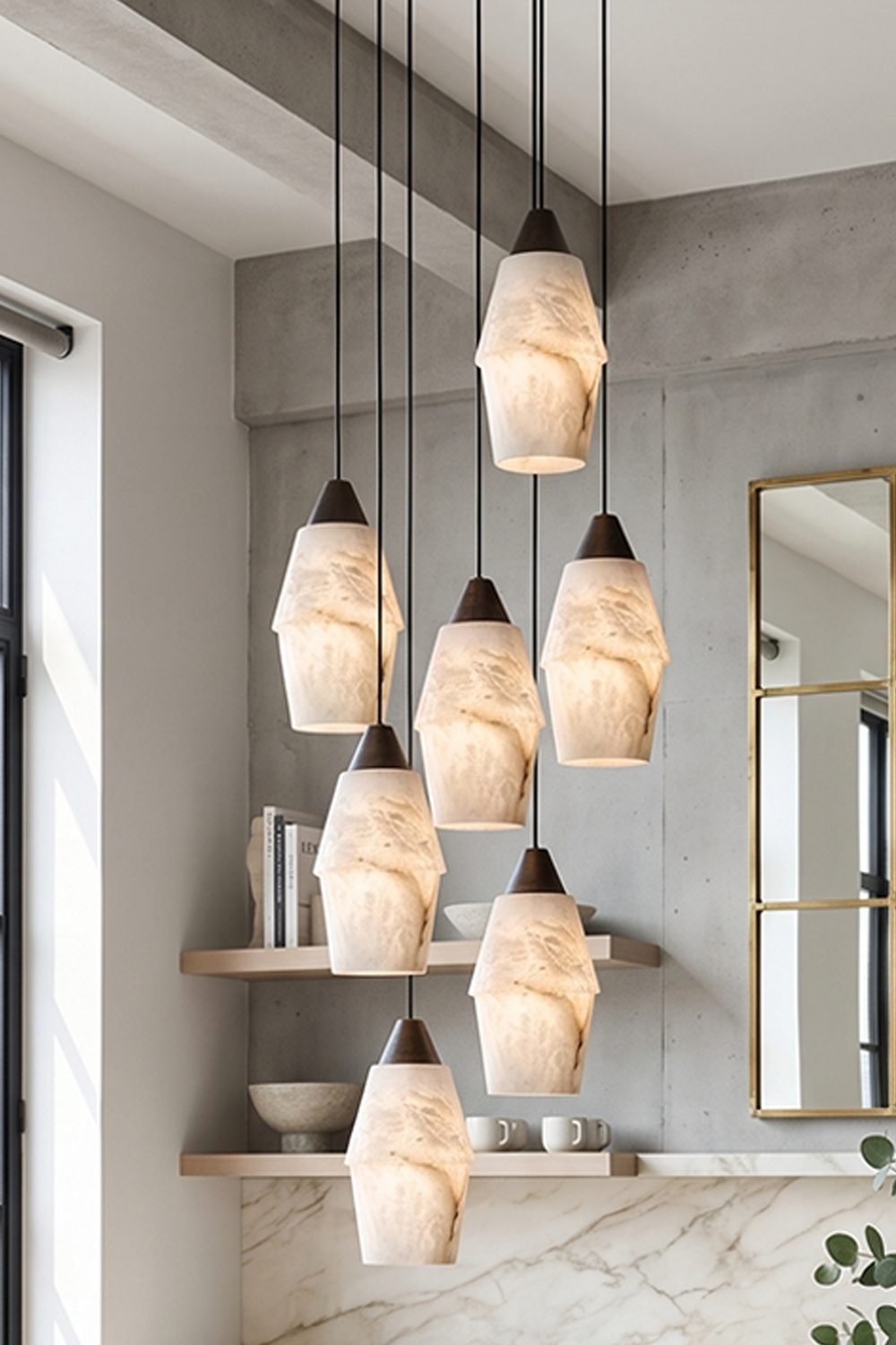 Gemma Staggered Alabaster Cluster Chandelier | Staggered Cluster Detail | Closer shot focusing on the group of glowing organic rock-like stone pendant shades casting a rich golden halo | vexa lamps