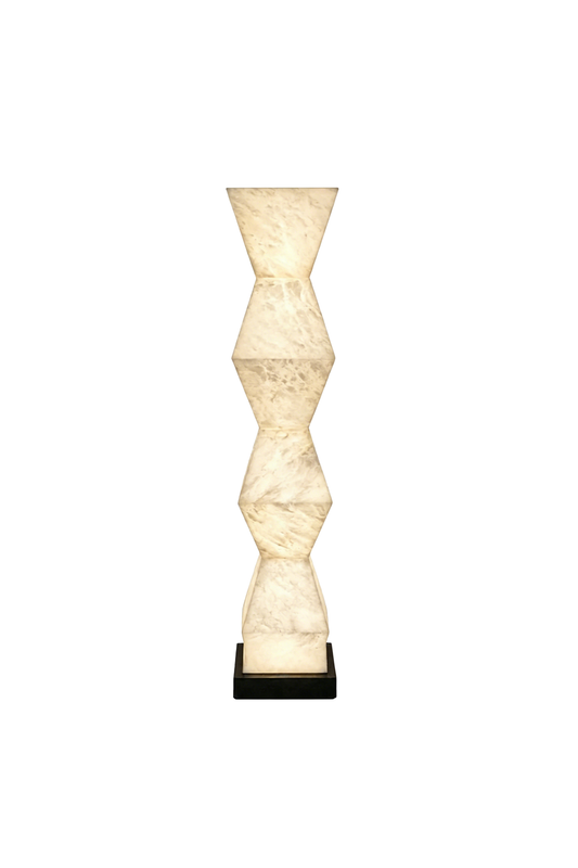 Kellan Geometric Alabaster Floor Lamp | Alabaster, Metal | Modern stacked geometric totem floor lamp crafted from translucent natural alabaster stone panels emitting a warm inner glow on a black base | Isolated product shot on white background | vexa lamps