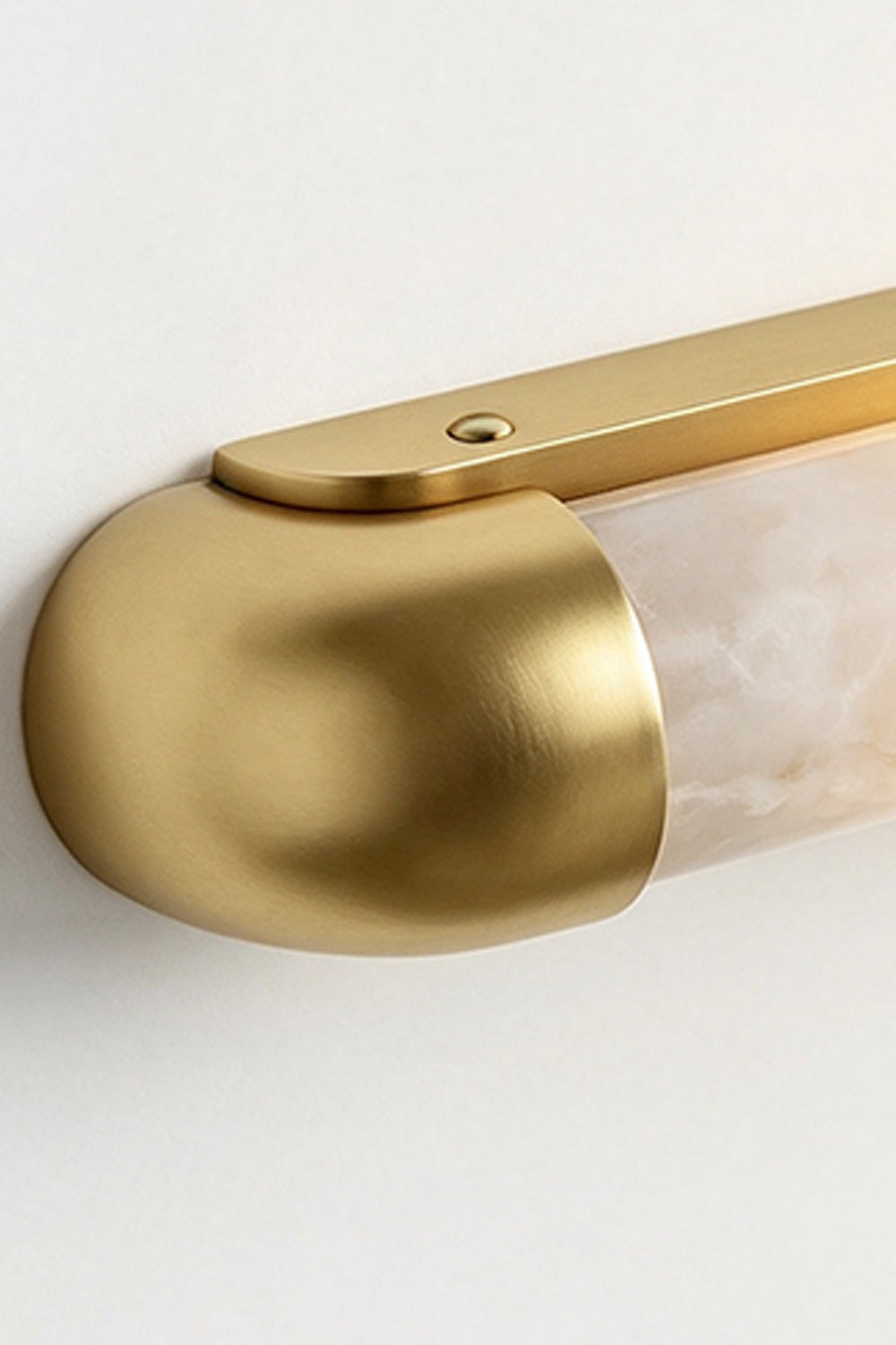 Kester Alabaster Tube Wall Sconce close-up view, showcasing the alabaster and gold metal details.