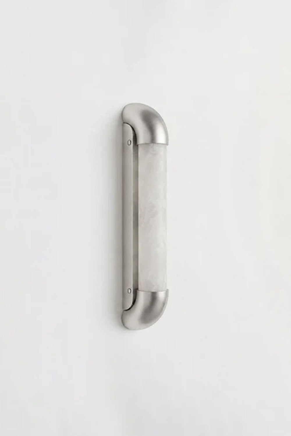 Kester Alabaster Tube Wall Sconce with a sleek curved metal frame and natural alabaster shade