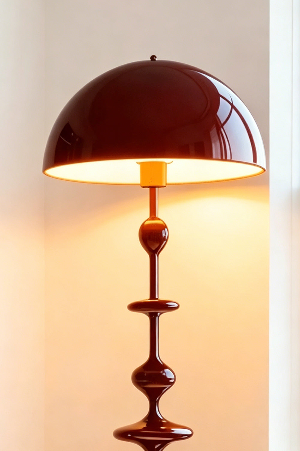 Kira Beaded Mushroom Floor Lamp | Metal, Glossy Finish | Close-up view of the illuminated burgundy red variant, highlighting the warm light glowing beneath the glossy shade | vexa lamps