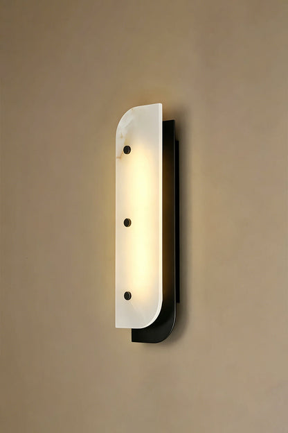 Lit alabaster wall sconce | Alabaster, Metal | Illuminated view against plain wall | vexa lamps