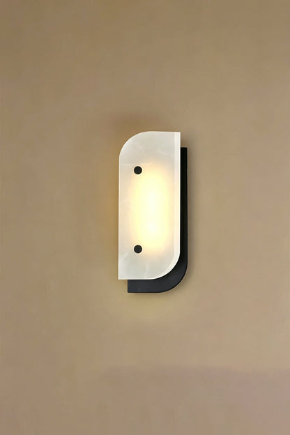 Unilluminated alabaster wall light | Alabaster, Metal | Unlit product shot against textured wall | vexa lamps