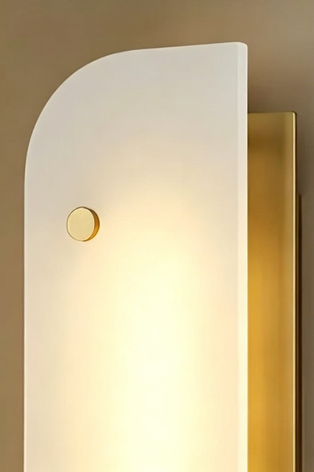 Illuminated alabaster wall light | Alabaster, Metal | Lit product shot against textured wall | vexa lamps