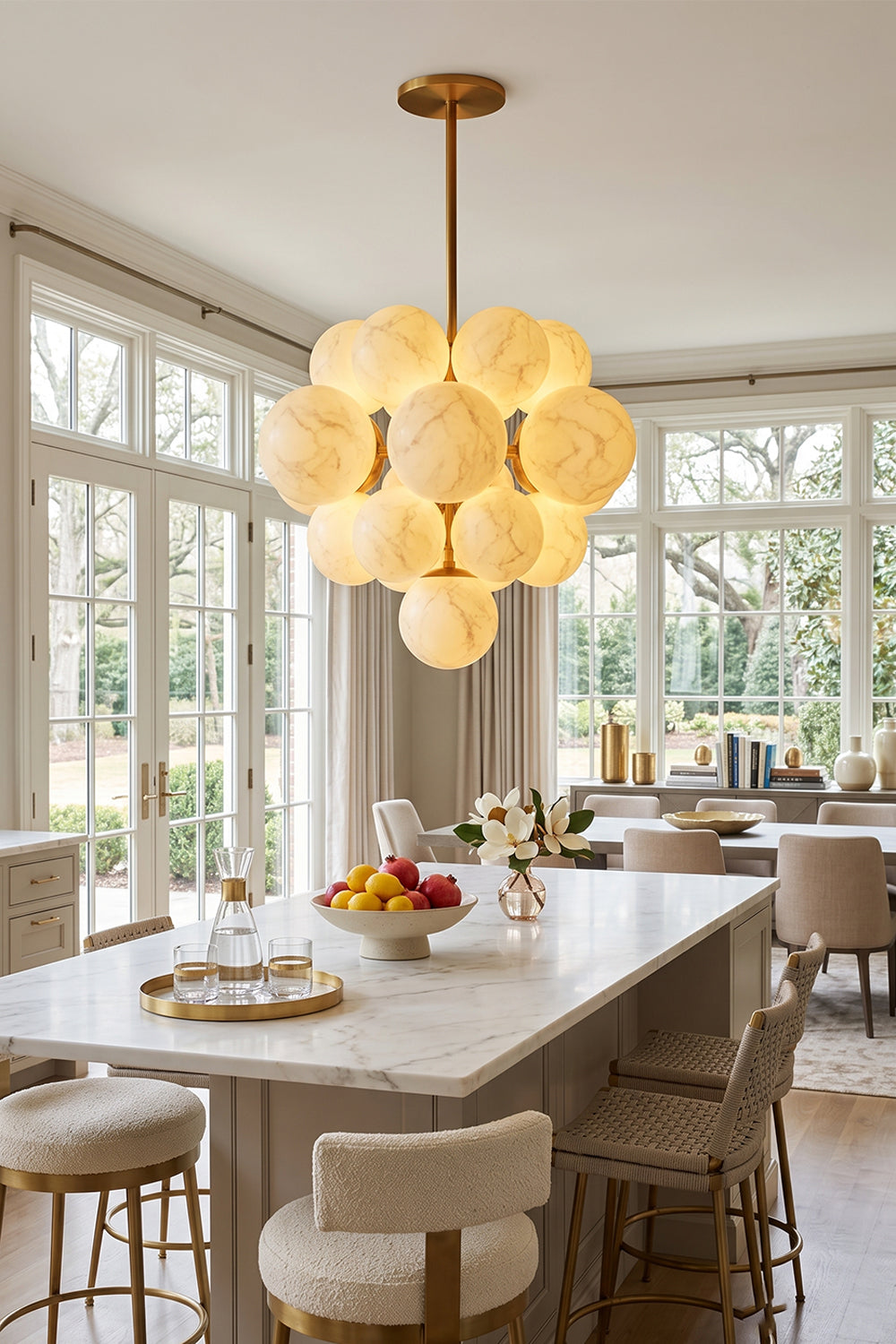 Marcella Alabaster Grape Cluster Chandelier illuminating a modern kitchen with elegant design.