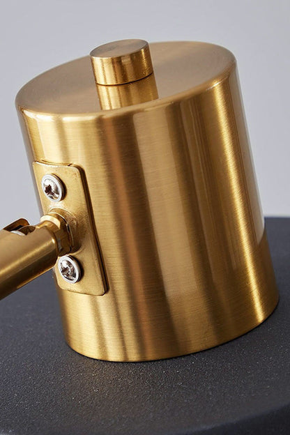 Marlowe Gooseneck Reading Floor Lamp | Matte Black and Brass | Detailed close-up of the polished gold brass top cap and shade mounting hardware | vexa lamps