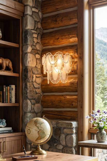 Mirella Pearl and Glass Wall Lamp illuminates a rustic home office with elegant design and warm gold accents.