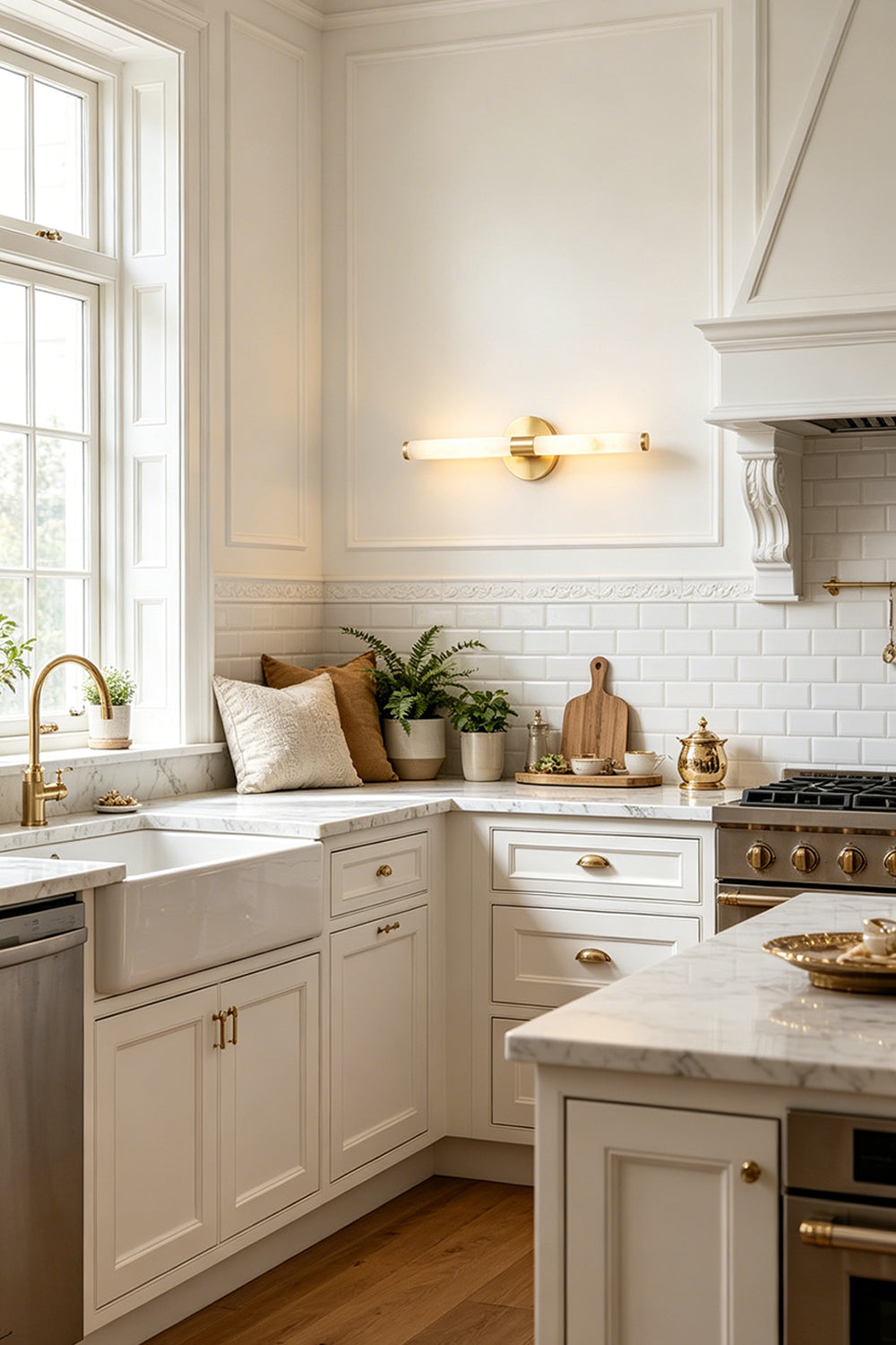 Nerida Linear Alabaster Wall Sconce | Alabaster, Brass | Installed horizontally as a luxury wall accent in a classical kitchen with white cabinetry and premium marble countertops | vexa lamps