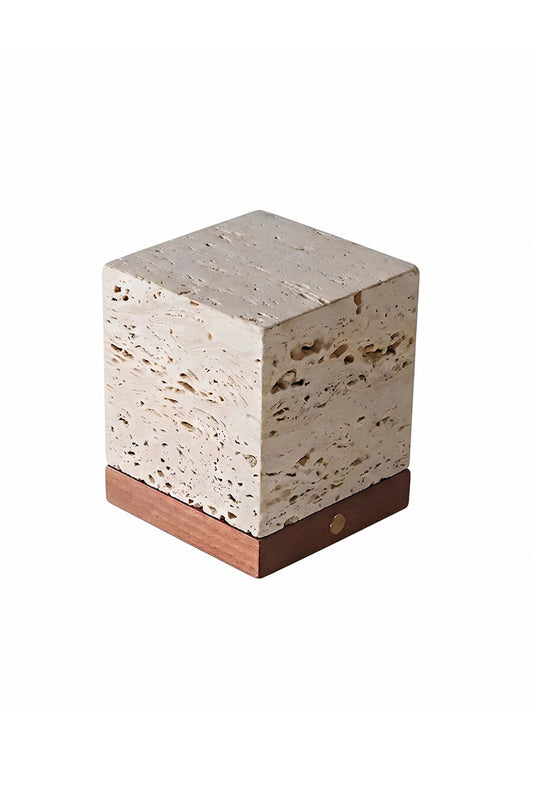 Radiant Monolith Travertine Table Lamp | Travertine, Wood | Unlit 3/4 perspective isolated white background | Raw stone texture, dark wood base | Gold switch detail | vexa lamps