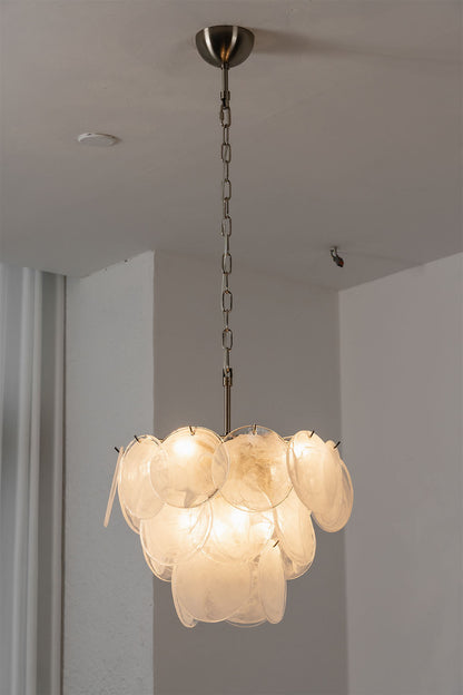 Romilly Layered Glass Disc Chandelier hanging from a ceiling with soft illumination and layered glass design.