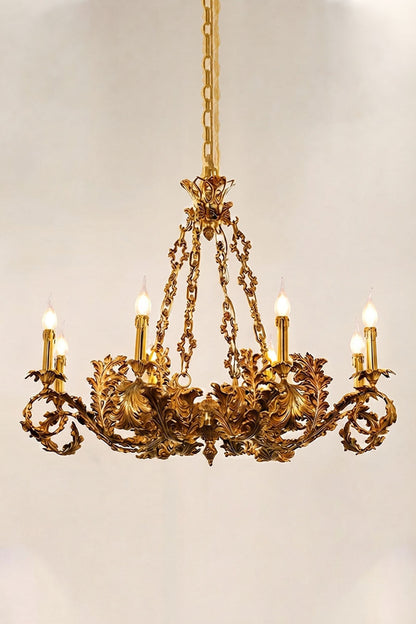 Rurik Acanthus Leaf Brass Chandelier with ornate leaf design and six candle-like lights.