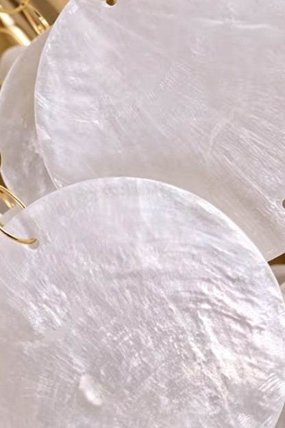 Close-up detail of natural shell discs | Shell | Macro shot showing the iridescent texture and sheen | vexa lamps