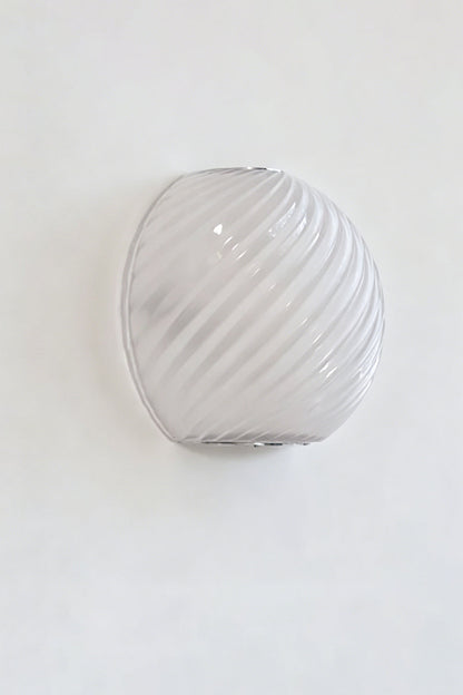 Silas Ribbed Glass Wall Sconce | Ribbed Glass, Metal | Studio unlit view of the white frosted opal ribbed glass finish option displaying its smooth textured surface | vexa lamps