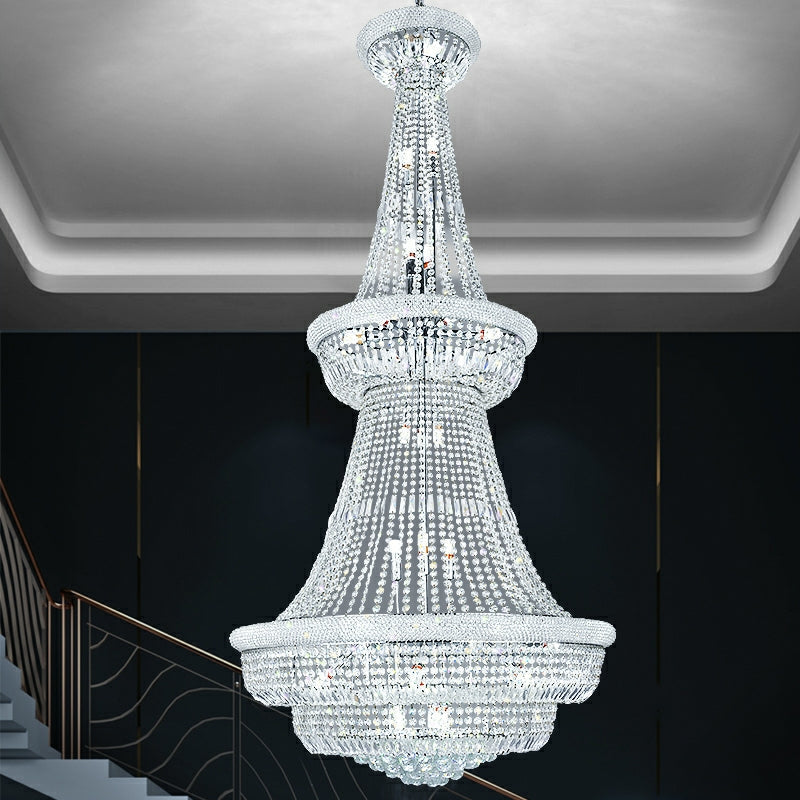 Morylighting Grand Radiance Round Crystal Chandelier - dramatic American stairwell with soaring ceiling