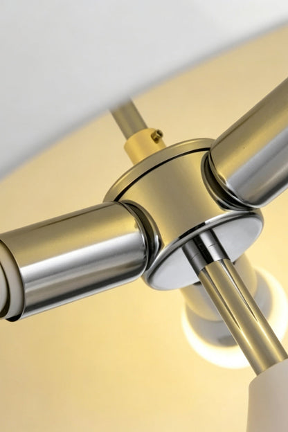 Solene Domed Glass Table Lamp | White Frosted Glass | Macro close-up shot focusing on the internal polished gold and chrome metal hardware structure | vexa lamps