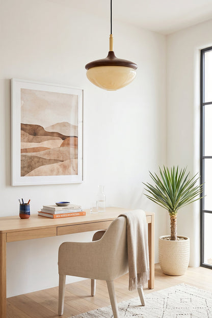 Soren Wood Grain Pendant Lamp | Wood, Glass, Metal | Suspended over a minimalist light wood writing desk with a cream chair and desert art frame | vexa lamps