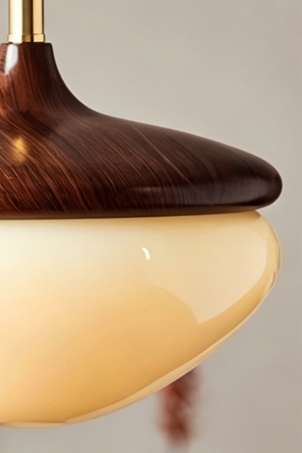 Soren Wood Grain Pendant Lamp | Wood, Glass, Metal | Profile detail shot showcasing the elegant seamless junction between the wood cap and glowing glass diffuser | vexa lamps