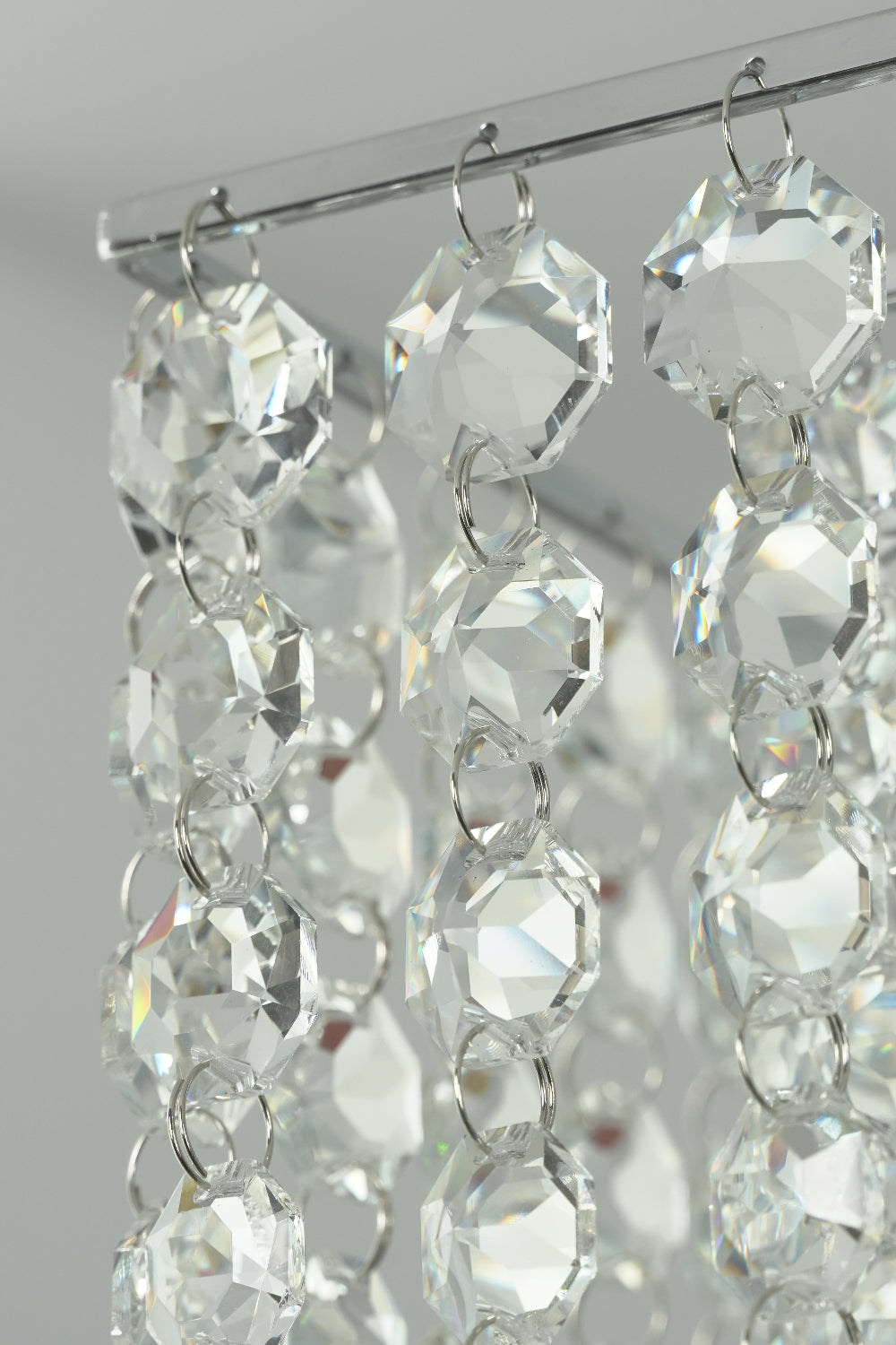 Vertical strands of sparkling crystal beads | Crystal | Close-up showing the clarity and arrangement of crystals | vexa lamps