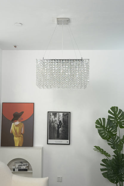 Tiered crystal frame chandelier in a high-end residential setting | Stainless Steel, Crystal | Interior view showing the modern layout and decor | vexa lamps
